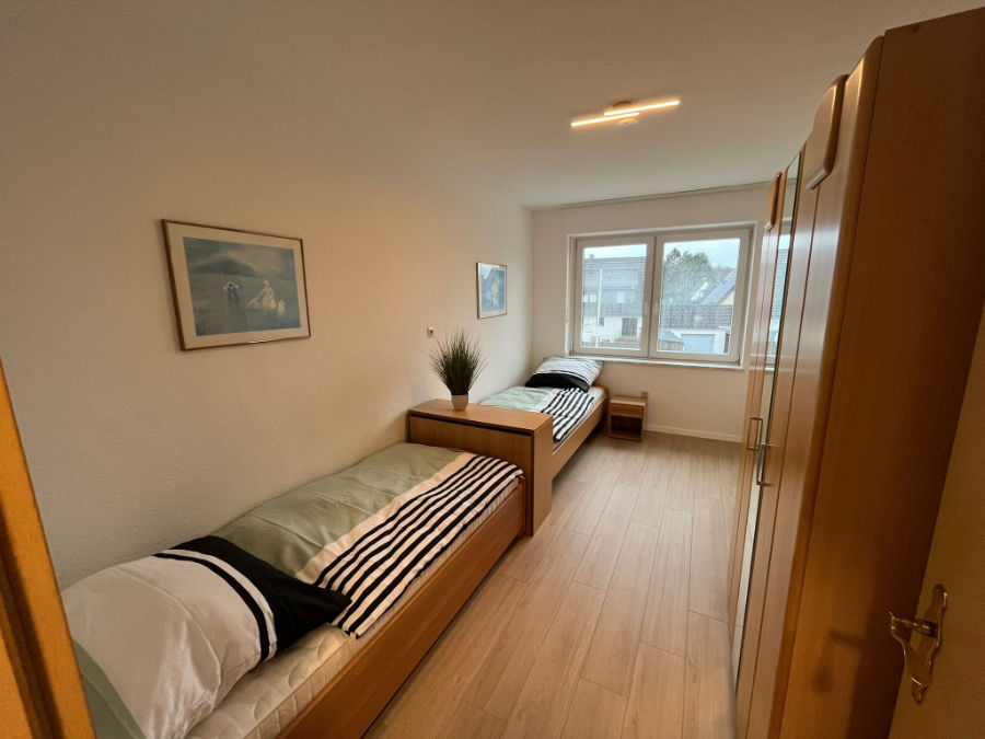 Schlafzimmer 01 der 4-Zimmer-Wohnung in Dülmen | Schlafzimmer der Monteurwohnung in Dülmen mit zwei Einzelbetten